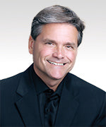 Mark E. White